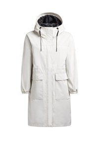 Cappotto lungo bianco impermeabile con cappuccio, dotato di due grandi tasche frontali e polsini elasticizzati. Interno foderato in materiale nero.