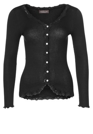 Svart, ribbestrikket langermet cardigan med en scalloped blondekant rundt halsen og nederst, og seks hvite knapper foran. Myk tekstur.