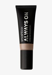 Tube en plastique noir avec une finition mate et un bouchon noir brillant. L'étiquette indique "Smashbox Always On Cream Shadow." Couleur : beige neutre.
