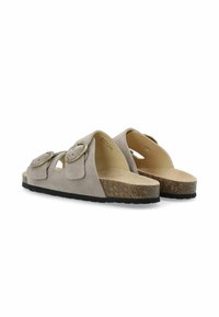 Light grey suede sandals with two decorative buckles, a thick cork midsole, and a textured rubber outsole for grip.