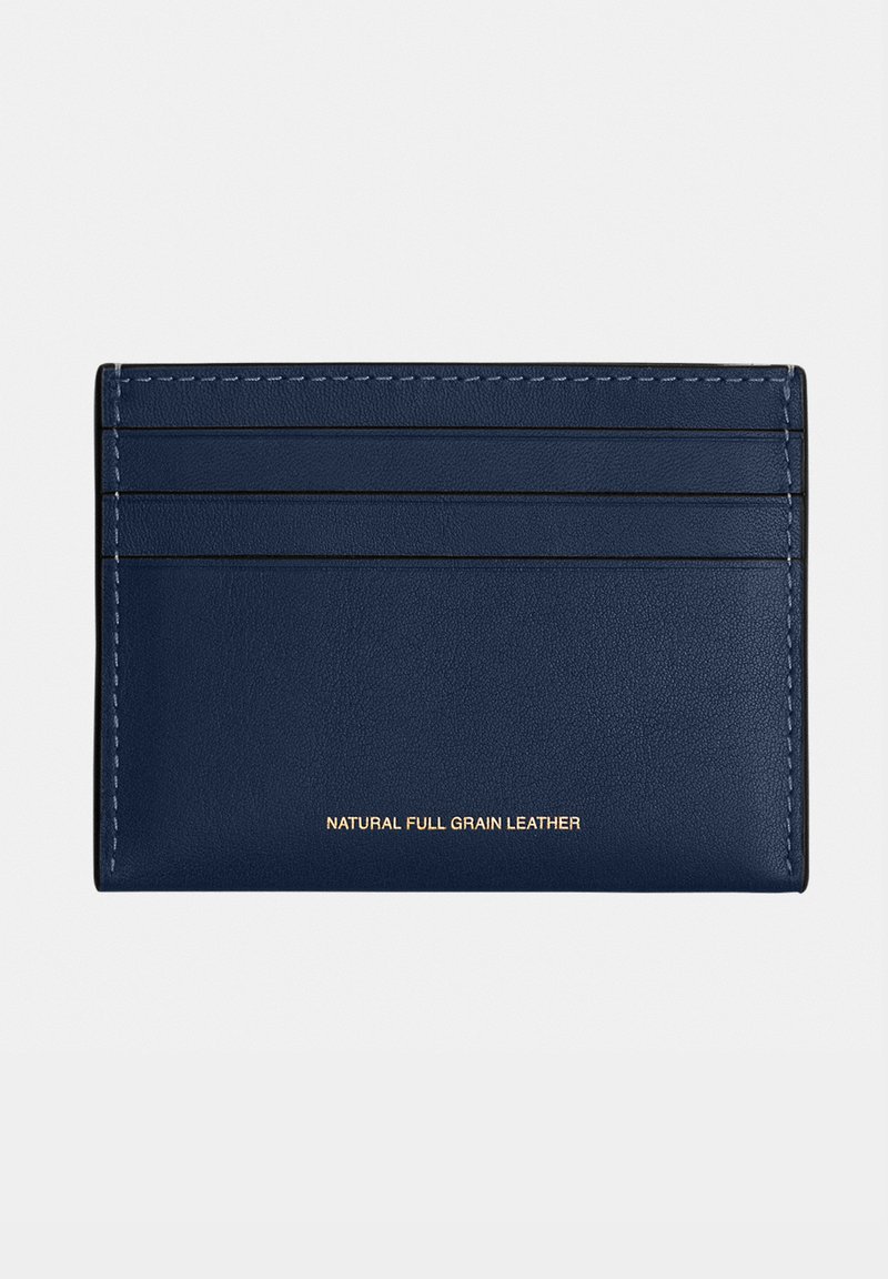 Navy blue leather cardholder with four card slots and gold text "Natural Full Grain Leather" centered on the lower half.