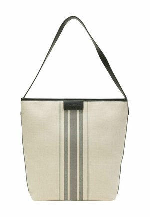 Beige tote bag med ett enda svart bärhandtag, som har tre vertikala svarta ränder i mitten och en liten svart logotyp på toppen.