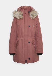 Parka rose avec capuche en fausse fourrure, fermeture éclair et boutons, deux poches avant, taille élastique et poignets noirs.