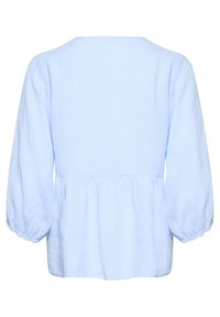 Lyseblå bluse med lange, puffede ærmer. L.formet talje detalje, glat linned struktur og rund halsudskæring skaber en afslappet silhuet.