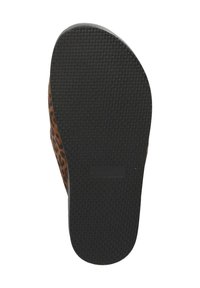 Luipaardprint bovenkant met een geribbelde zwarte rubberen zool. Het design heeft vloeiende lijnen met textuurpatronen en een lage profiel.