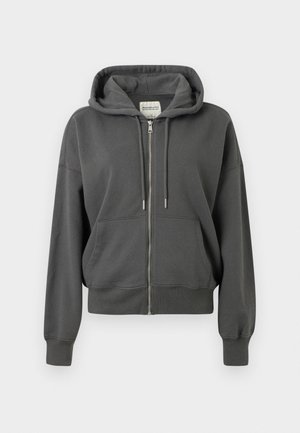 Dunkelgrau zip-up Kapuzenpullover mit Fronttaschen, verstellbarem Kordelzug an der Kapuze sowie gerippten Bündchen und Saum, auf einem einfarbigen Hintergrund präsentiert.