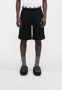 GCDS ESSENTIALS - Shorts - black