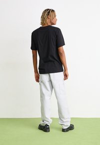 Carhartt WIP NOODLE - T-shirt con stampa - black