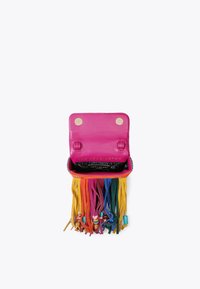 Fuchsia leather purse with colorful fringe in yellow, orange, red, blue, and green. Metallic snap closure, interior branding visible.