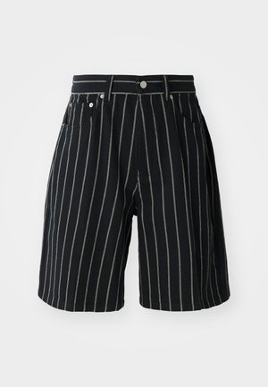 Black striped shorts made of cotton, featuring contrasting white vertical stripes, a button closure, and front pockets.