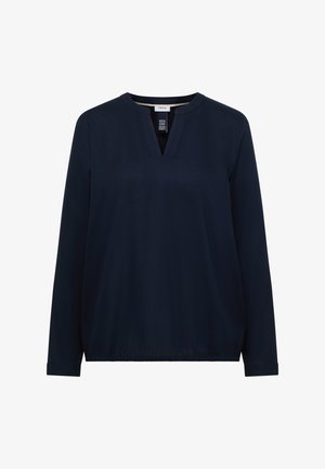 Top de manga larga azul marino con escote en V, dobladillo elástico y tejido suave. Presenta una etiqueta con el nombre de la marca "CECI" en el cuello.