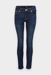 Dark blue slim fit jeans with orange stitching, button and zipper closure, front and coin pockets, displayed against a plain background.