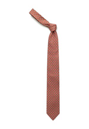 Oranssi solmio, jossa on solmu ja toistuva geometrinen kuusikulmioiden sekä pienten sinisten, valkoisten ja mustien muotojen kuvio.