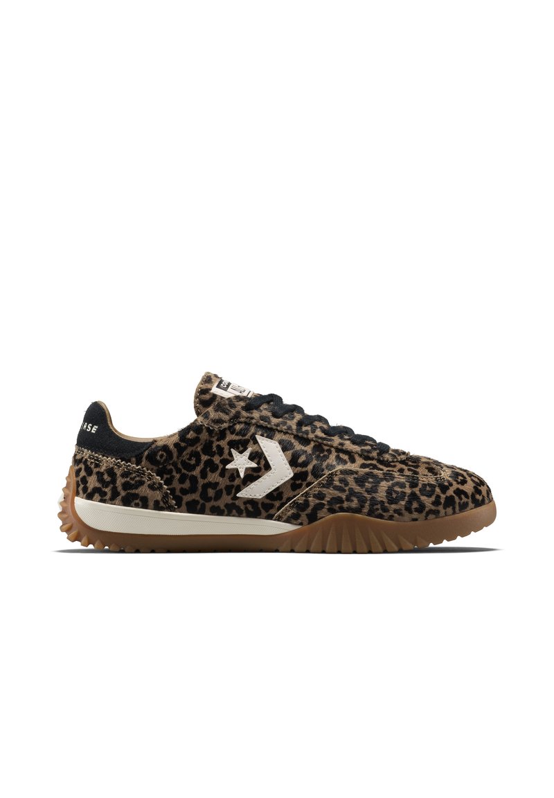 Leopard-print sneakers with a textured upper, black laces, white logo, and a gum rubber sole featuring a zigzag pattern.