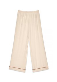 Gai beigu platā kāja bikses, izgatavotas no mīksta auduma ar elastīgu jostu un kontrastējošu tumši brūnu apdari apmales malā.