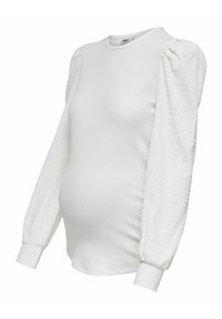 Top premaman bianco con un corpo a coste aderente e maniche a palloncino testurizzate. Presenta un collo a giro e polsini rifiniti. Tessuto morbido in generale.