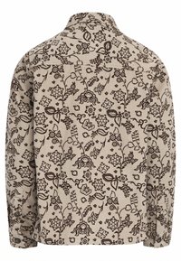 Πουκάμισο με λουλουδάτο σχέδιο από σουέτ, σε μπεζ φόντο με καφέ λουλούδια και κλήματα, με γιακά και κουμπωτές μανσέτες.