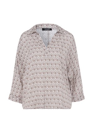 Leichte, grau-beige Bluse mit einem geometrischen weißen Muster, V-Ausschnitt und dreiviertel Ärmeln. Weicher Stoff mit lockerer Passform.