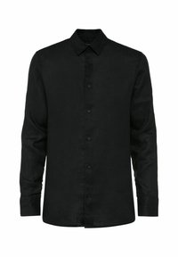 Czarna koszula z długim rękawem wykonana z lnu, z zapięciem na guziki z przodu, spiczastym kołnierzykiem i subtelnym logo na piersi.
