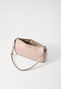 Pink leather clutch bag with gold hardware, zip closure, and adjustable strap. Features logo detail on the front and a smooth texture.
