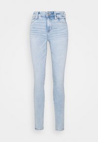 Lyseblå skinny jeans laget av denim, med høy midje, frontlommer og en glatt, svakt falmet tekstur. Sølvfarget knappelukking.