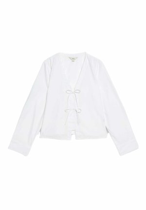 Witte wikkeltop met lange mouwen, V-hals en een sluiting met strik aan de voorkant. Gemaakt van een soepele stof met een relaxte pasvorm en zonder patronen.