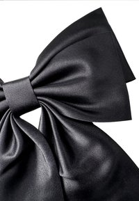 Black satin bow with wide, smooth loops and a central knot, featuring a glossy finish and intricate folds, creating a textured appearance.