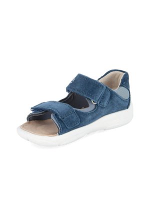 Niebieska sandałka zamszowa z otwartym palcem, regulowanymi paskami na rzepy i białą podeszwą, zaprojektowana dla komfortu i łatwości noszenia.