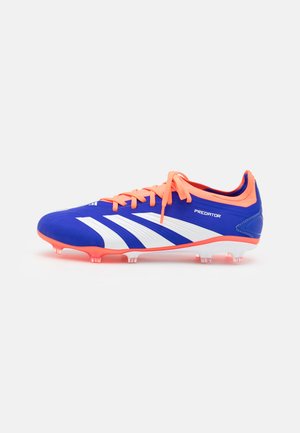 Blue soccer cleat with white stripes, orange accents, and textured synthetic material. Features a lace-up design and transparent studs.