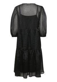 Robe noire longueur genou avec manches bouffantes transparentes, tissu superposé, encolure carrée et taille froncée.