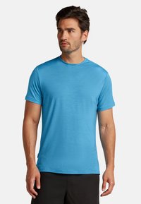 Men's short-sleeve T-shirt in bright blue, made from a smooth, lightweight fabric with a round neckline and a relaxed fit.