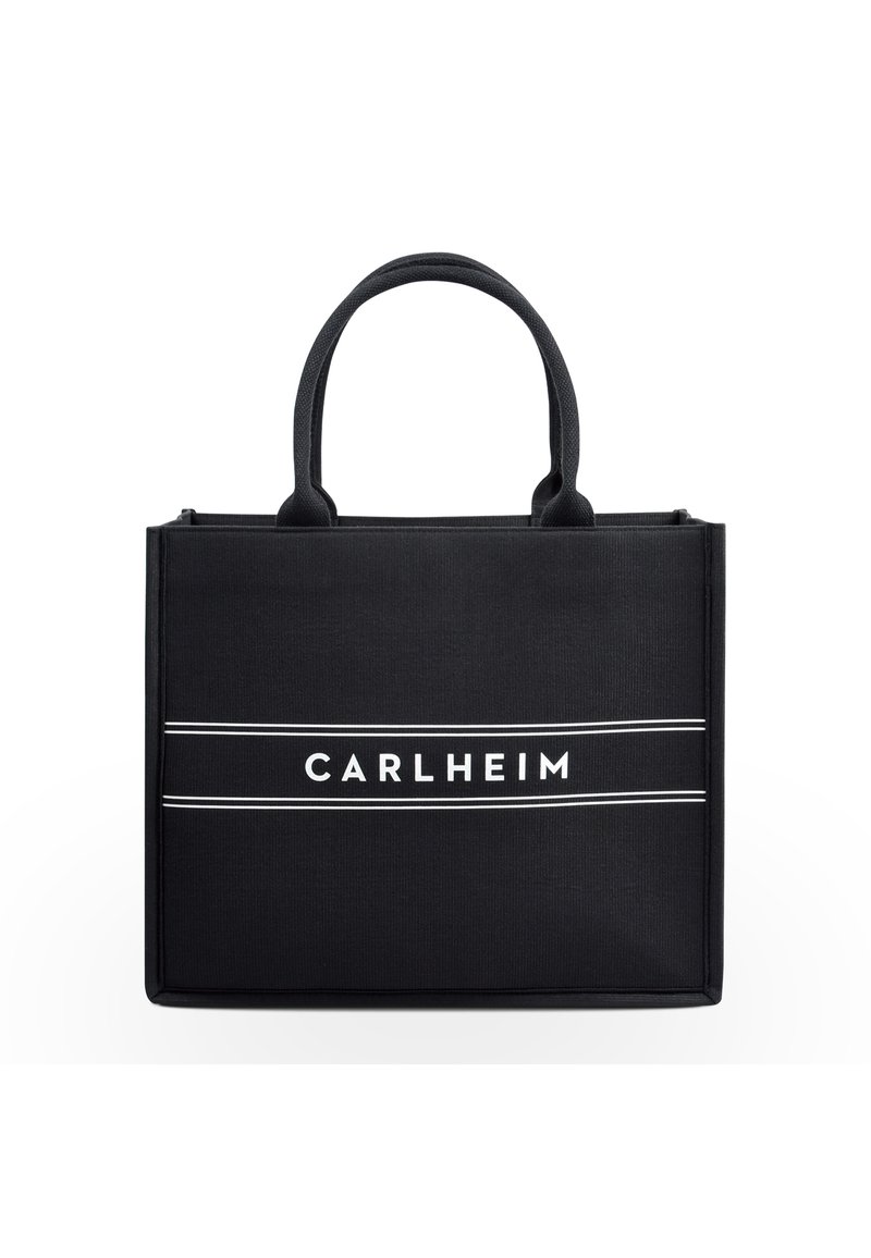 Black tote bag made of durable fabric featuring two top handles, a boxy design, and white “CARLHEIM” logo with horizontal stripes.