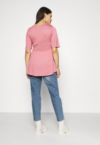 River Island Maternity Calças de ganga de corte afunilado - denim medium