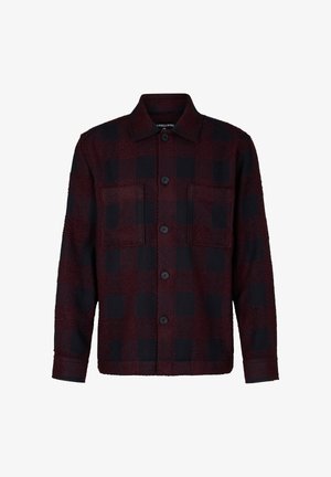Karierter Hemdjacke in Dunkelrot und Schwarz, mit Knopfleiste, zwei Brusttaschen und strukturierter Stoffqualität. Taillierter Schnitt mit langen Ärmeln.