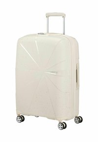 Valigia rigida con finitura testurizzata off-white con microgranul  di colore, dotata di manico telescopico e quattro ruote girevoli per la mobilità.