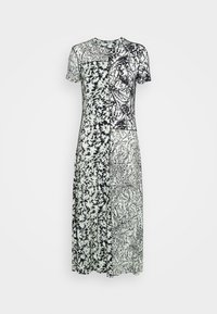 Czarna i biała sukienka midi w wzory z krótkimi rękawami, zawierająca mix kwiatowych i abstrakcyjnych wzorów. Gładki, lekki materiał.