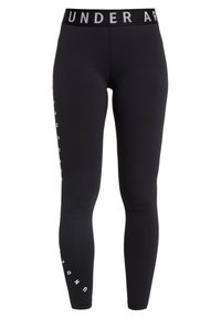 Black leggings made of stretchy fabric with a high waistband. Features "UNDER ARMOUR" logo in gray on the waistband and a white design on the side.