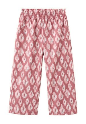 Pantalon rose ample avec motif ikat blanc en forme de losange et taille élastique.