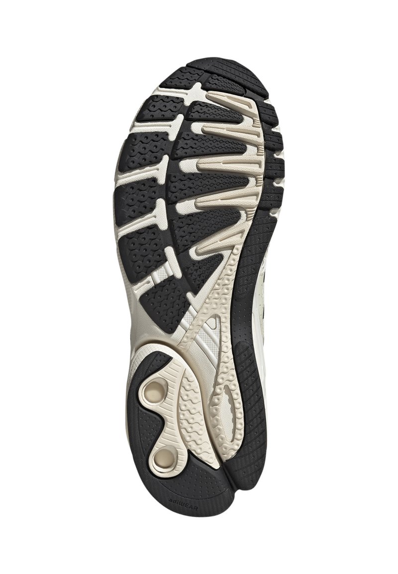 Schwarze und beige Sportzehensohle mit strukturierten Grip-Mustern und Dämpfungsdetails, entworfen für Halt und Unterstützung.