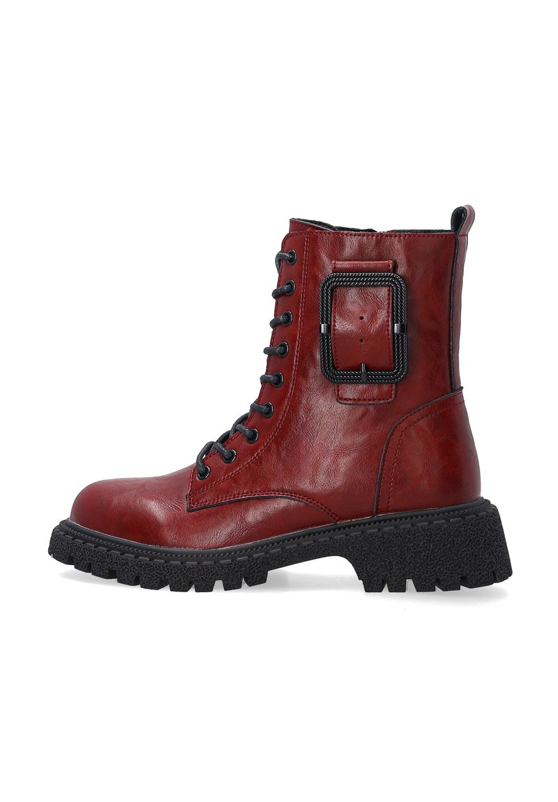 Red leather ankle boot with a round toe, lace-up front, textured black sole, and a decorative buckle on the side. Chunky design.