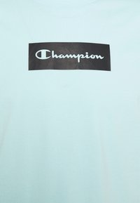 Champion T-shirt med print - light blue