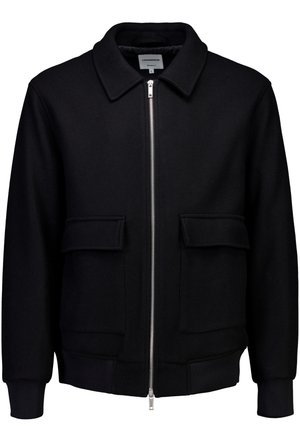 Black wool blend jacket with a zip front, pointed collar, two front pockets, and ribbed cuffs and hem. Smooth texture and structured design.