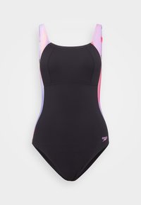 Maillot de bain noir avec des bretelles dégradées rose et violet, présentant un design ajusté et une texture lisse. Logo dans le coin inférieur droit.