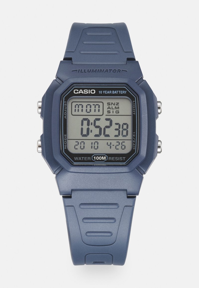 Digital wristwatch with a blue resin case and strap, featuring an LCD display. Notable details include water resistance up to 100 meters.