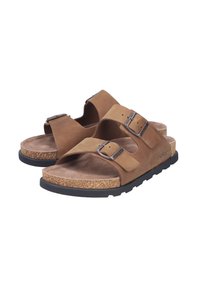 Sandales en cuir brun avec deux sangles réglables, boucles en métal, semelle en liège et semelle extérieure en caoutchouc noir. Texture intérieure douce semblable au daim.