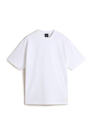 T-shirt bianco a maniche corte in cotone, dal fit rilassato, con scollatura rotonda e una piccola etichetta del logo sull'orlo inferiore.