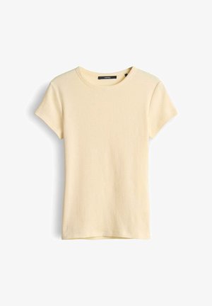 T-shirt à manches courtes, en maille côtelée de couleur crème, avec un col rond, présenté à plat sur un fond blanc.