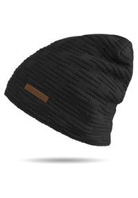 Black knitted beanie hat featuring a textured pattern and a small brown brand tag. The design is slouchy and fitted at the bottom.