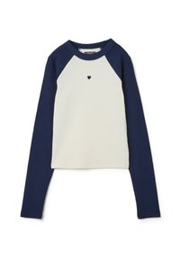 Langarm-T-Shirt in Creme und Marineblau, mit geripptem Stoff, Raglanärmeln und einer kleinen Herzstickerei in der Mitte.