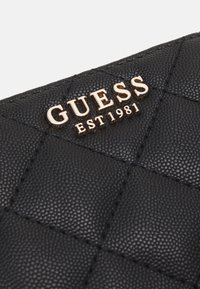 Guess CARLY SMALL ZIP AROUND - Pénztárca - black
